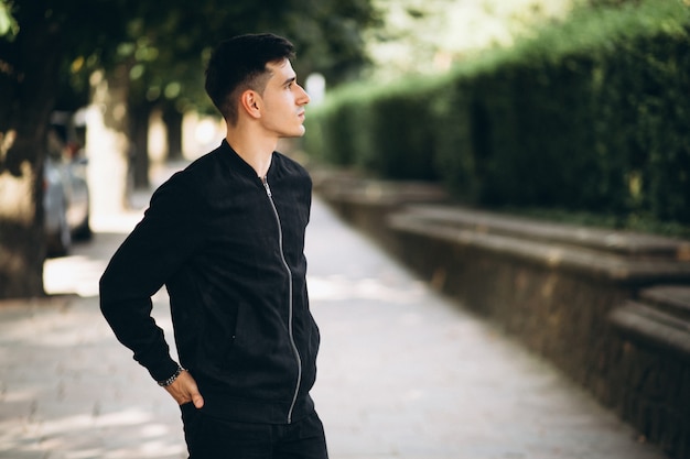 Handsome young man in park