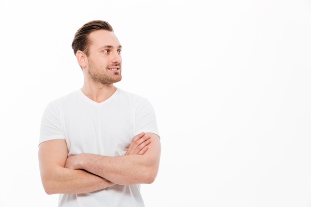 Handsome young man standing isolated