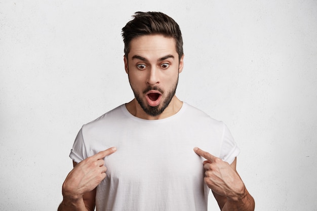 Handsome young man in white T-shirt