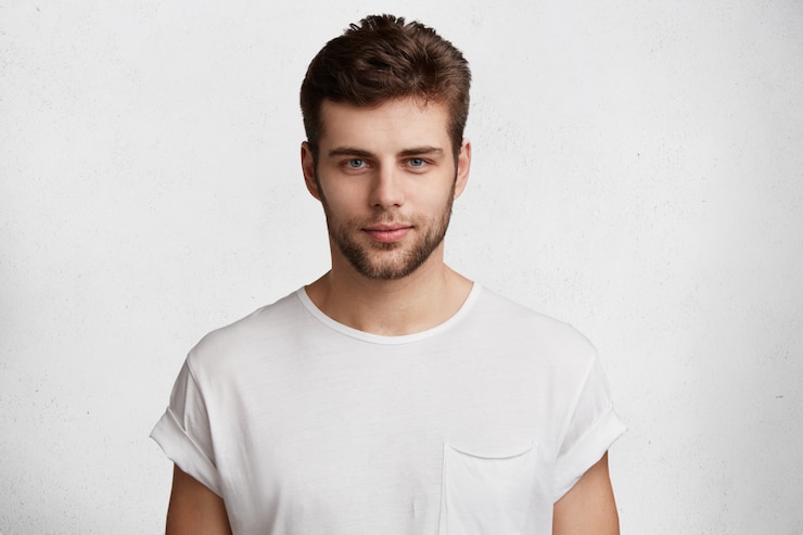 Free Photo handsome young man in white t-shirt