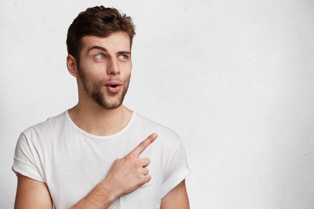 Handsome young man in white T-shirt