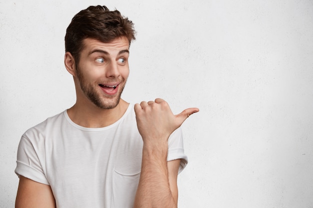 Handsome young man in white T-shirt