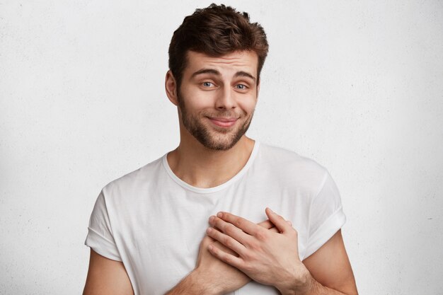 Handsome young man in white T-shirt