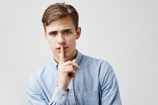 Handsome young man with thoughtful look