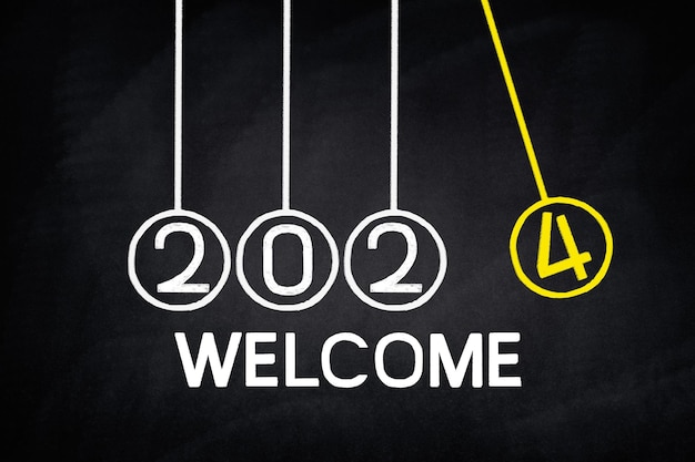 Free photo handwriting 2024 on blackboard countdown to 2024