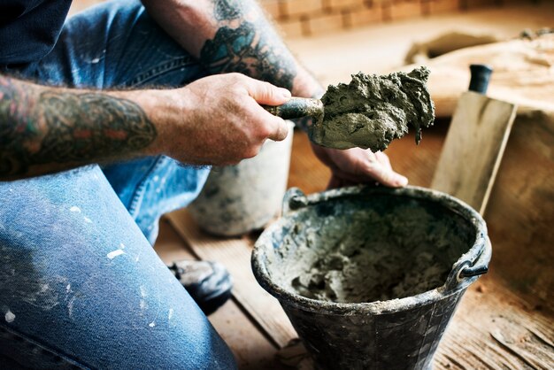 Handyman prepare cement use for construction