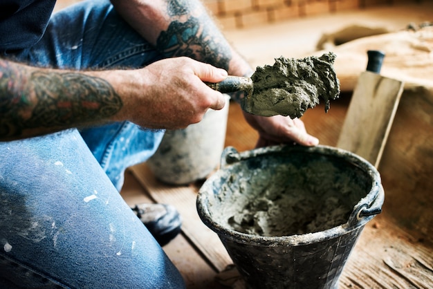 Handyman prepare cement use for construction