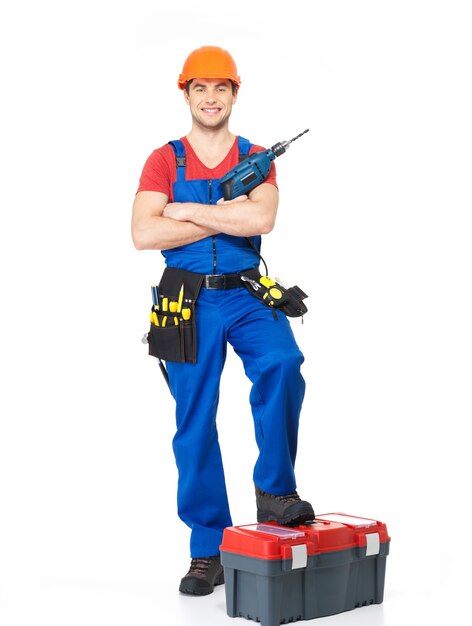 Handyman with tools full portrait on white