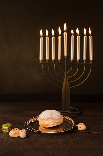 Hanukkah snack and symbols on table