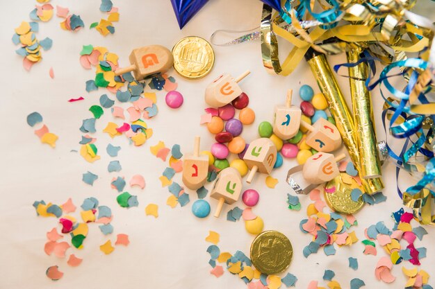 Hanukkah symbols near party decorations