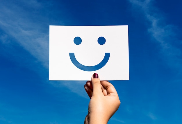 Free photo happines cheerful perforated paper smiley face