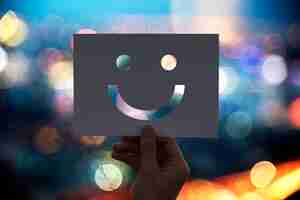 Free photo happines cheerful perforated paper smiley face