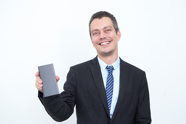 Happy Adult Business Leader Showing Smartphone