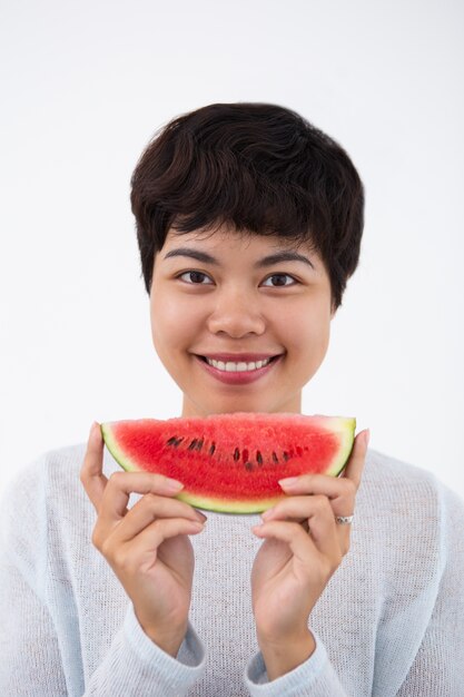 Happy Asian Woman Holding Slice of Watermelon