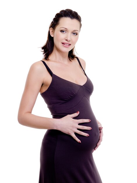 счастливая привлекательная беременная женщина