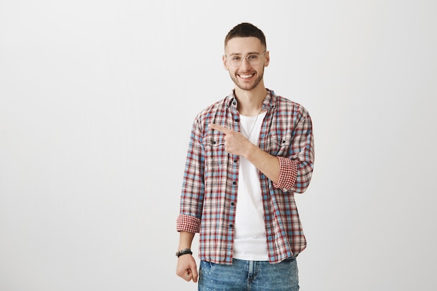 Happy attractive young guy posing