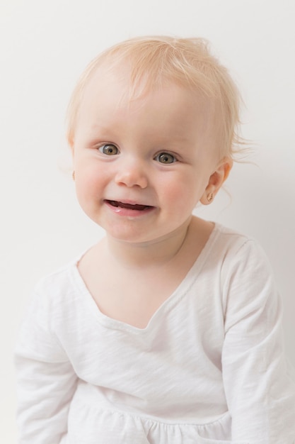 Free photo happy baby girl smiling and laughing