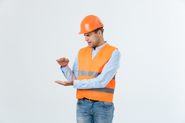 Cheerful Engineer Explaining Something – Free Stock Photo