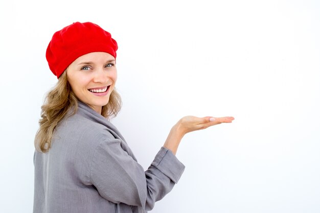 Happy beautiful young woman holding presentation