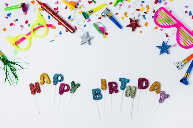 Free photo happy birthday lettering on white background