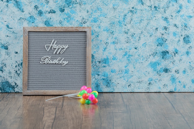 Happy birthday poster embedded on grey background