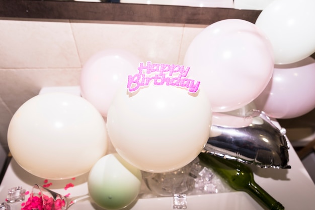 Happy birthday text on inflatable white balloon
