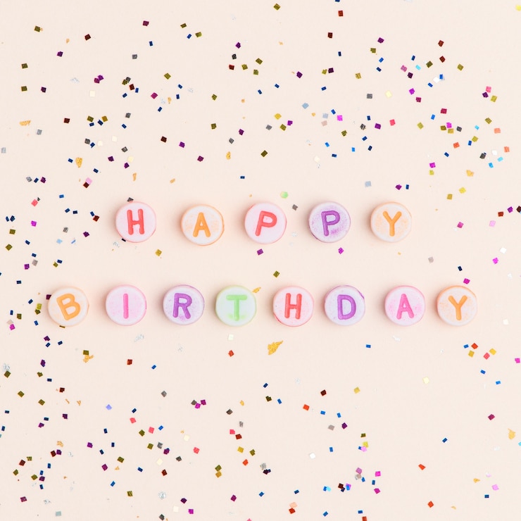 Free Photo happy birthday word alphabet letter beads
