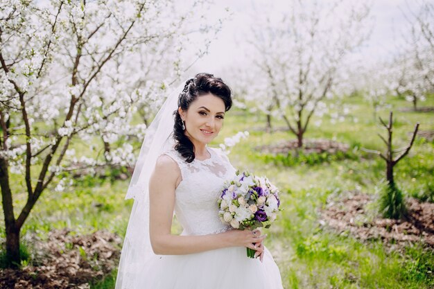 Happy bride outdoors