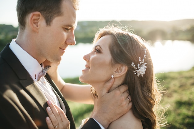 Happy brides admire each other