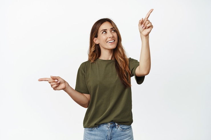 Free Photo happy brunette woman thinking making choice, looking at upper right corner and smiling thoughtful