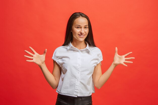 The happy business woman standing and smiling 