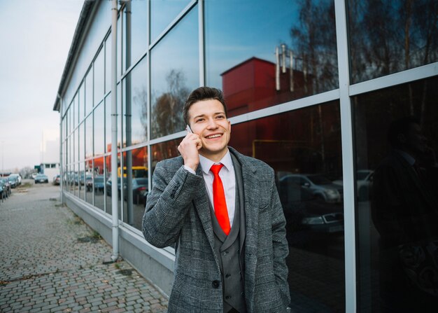 Happy businessman walking