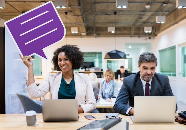 Happy businesswoman with speech bubble