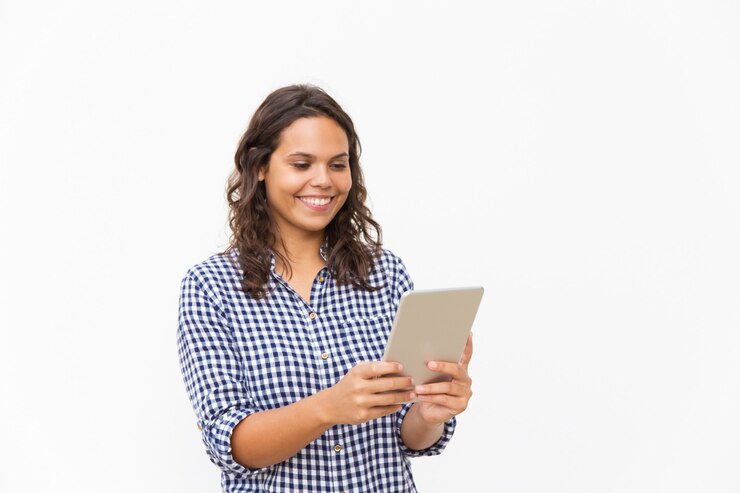 Free Photo happy cheerful woman using tablet