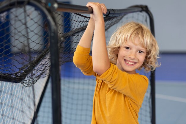 Happy child enjoying his gym class