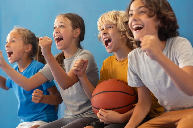 Happy children enjoying their gym class