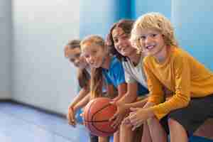 Free photo happy children enjoying their gym class