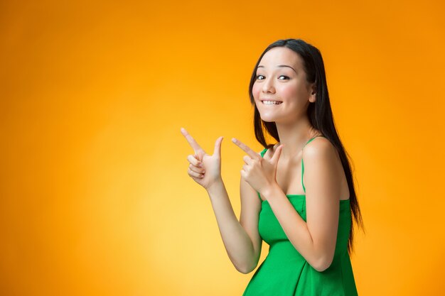 happy Chinese girl on yellow