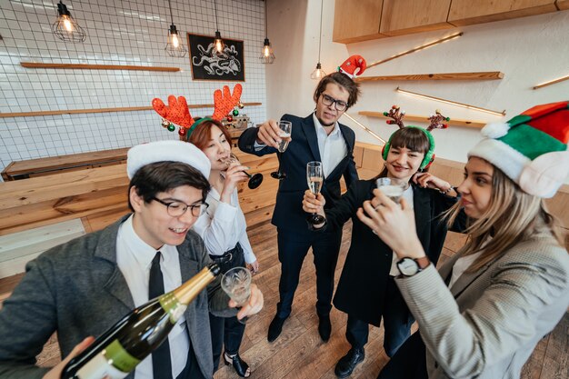 happy colleagues in office celebrate special event
