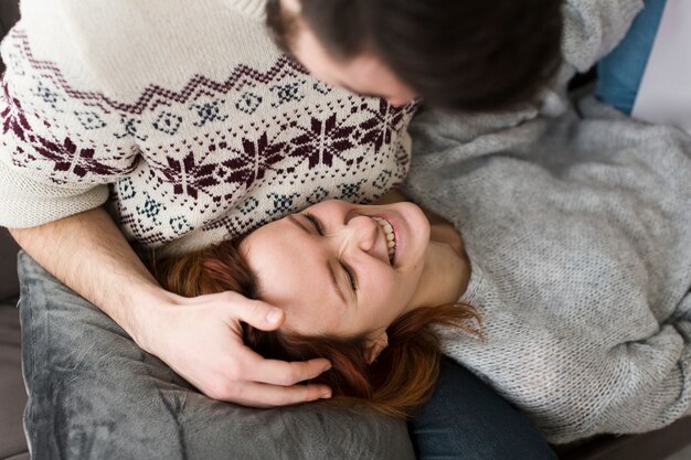 Happy couple in living room