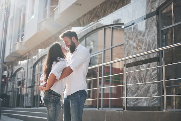 Happy couple in love on the street.