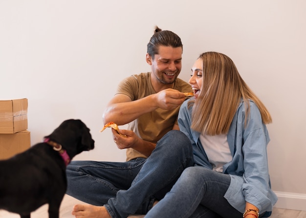 Happy couple moving in their new home