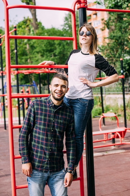 Happy couple posing in the park