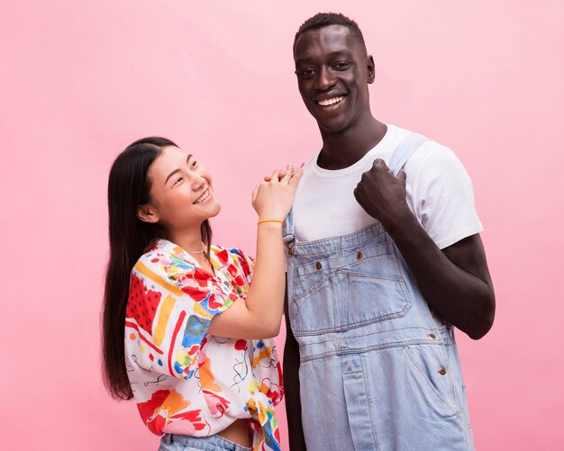 Happy couple posing in studio