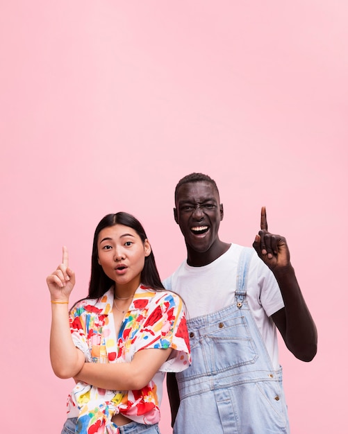 Happy couple posing in studio