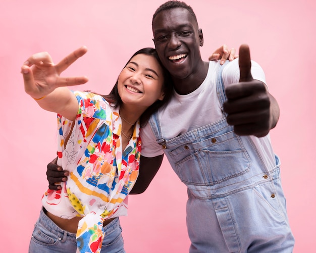 Free photo happy couple posing in studio