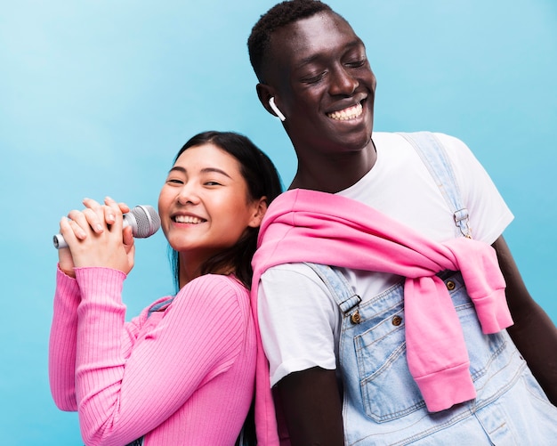 Happy couple posing in studio