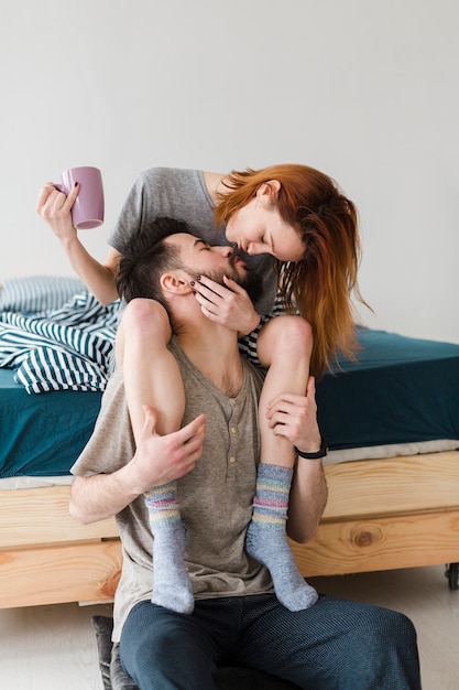 Happy couple spending time indoors