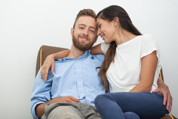 Happy couple spending time together at home