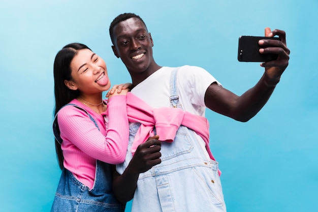 Happy couple taking a selfie